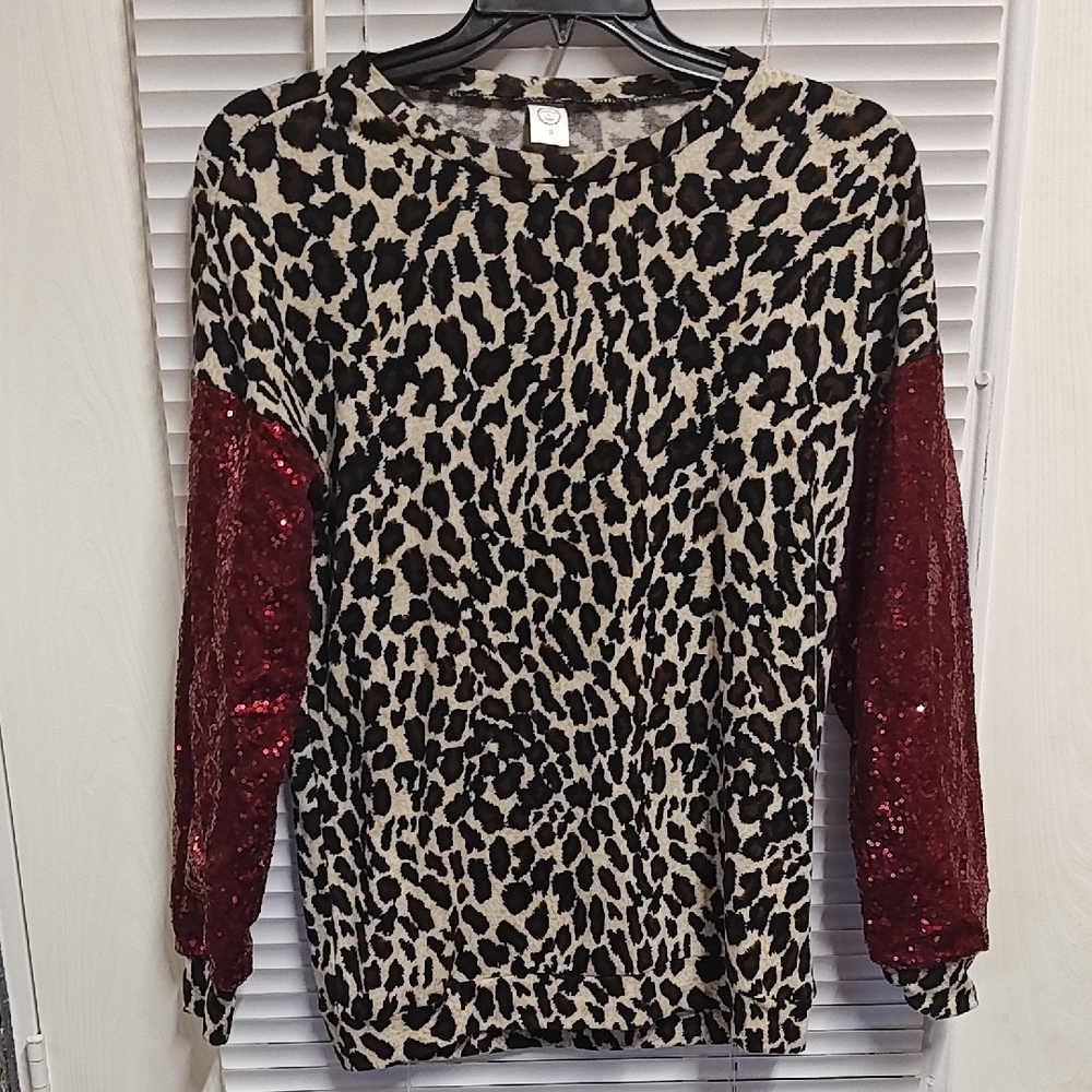 Sunshine & Rodeos Sequin Sleeve Animal Print Top